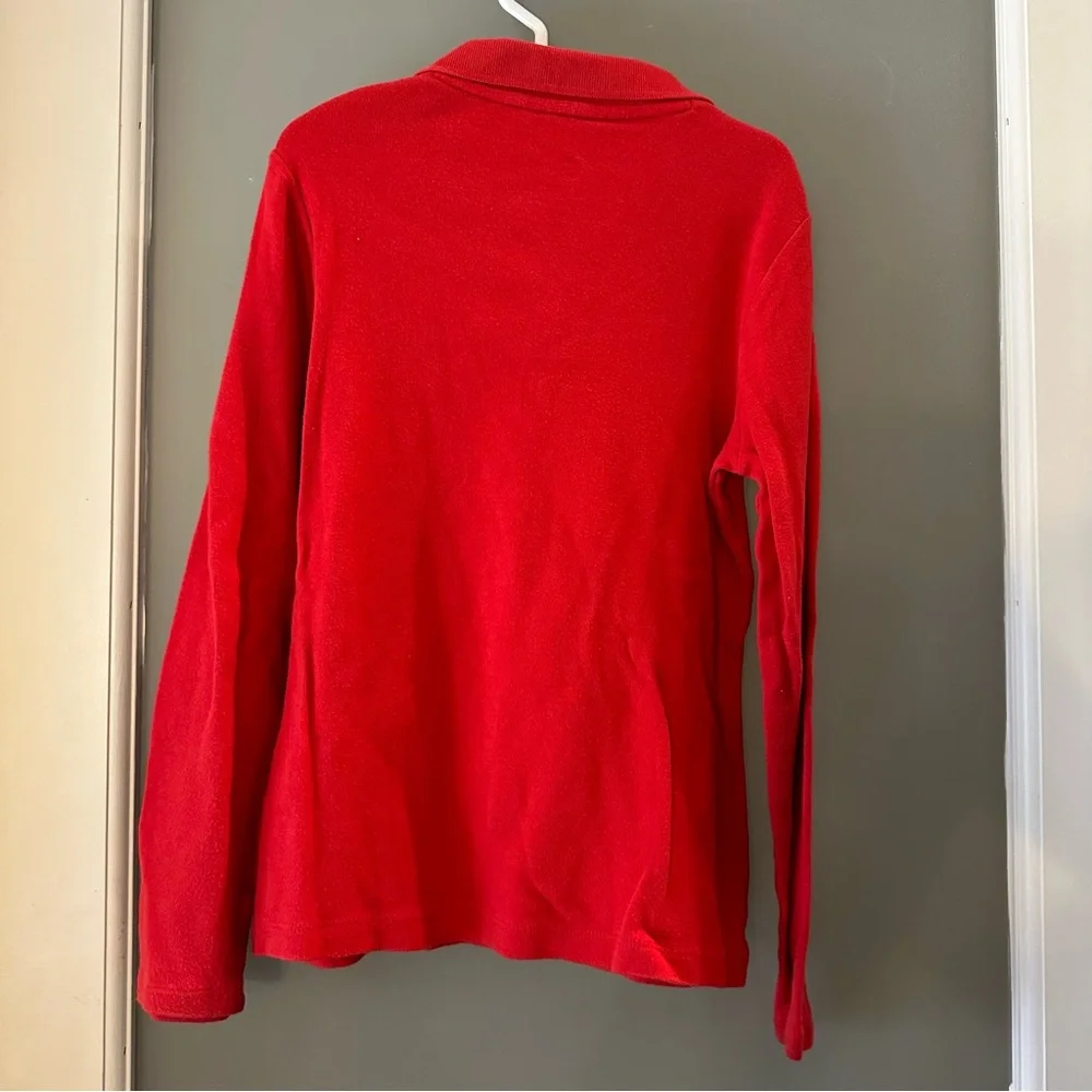 Justice red long sleeve polo shirt. Girls size 8